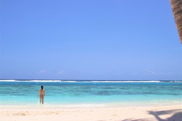 Woman at Beautiful beach in Maldives