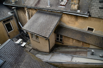 View from the window at the yard in french town. French architecture concept