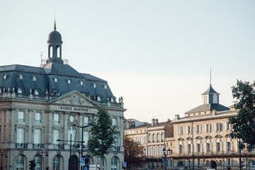 Fototapeta na wymiar Cityscape in Bordeaux on Place de la Bourse with classical french architecture