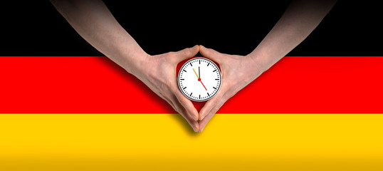Angela Merkel diamond hand gesture with german flag - obrazy, fototapety, plakaty