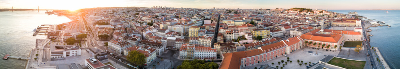 Naklejka na ściany i meble Aerial drone sunset panorama photo of Lisbon, Portugal.