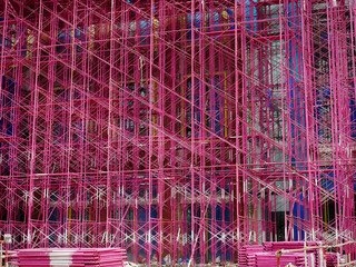 Full Frame Background of Pink Scaffolding at Construction Site