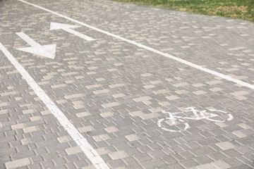 Bicycle lane with marking on sunny day