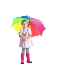 Little girl with rainbow umbrella on white background