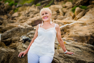 woman sitting on a rock