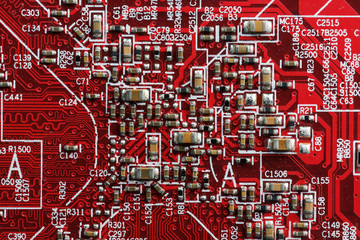 Electronic circuit board close up. Processor, chips and capacitors.