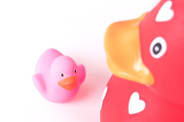 Large red rubber duck with a small duck