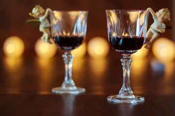 Two glasses of red wine with Christmas decoration