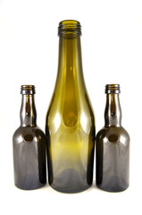 Wine bottles on white background close-up  