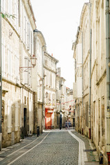 Fototapeta na wymiar Street view in old french town with traditional architecture