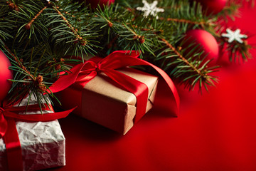 Christmas background with xmas tree and sparkle bokeh lights on wooden canvas background. Merry christmas card. Winter holiday theme. Happy New Year. Space for text. Happy Holidays