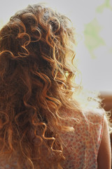 Hair stylist makes the bride a wedding hairstyle
