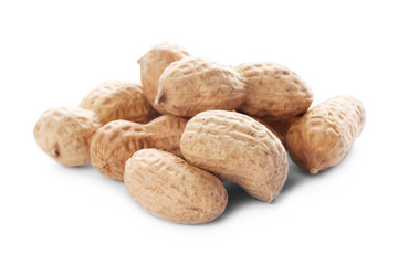 Raw peanuts in pods on white background