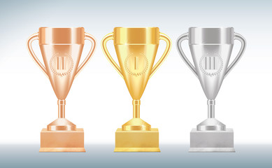 Set of golden, bronze and silver Trophy cups or goblets isolated on white background. Realistic Vector illustration
