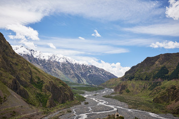 Landscape of a valley of a mountain valley, mountains background mountain river