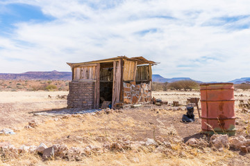 A abandoned shack in a beautiful landscape of Damaraland, Namibia.