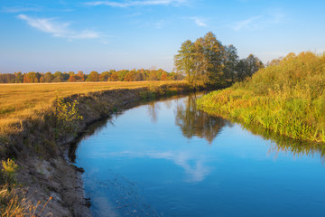 Fototapeta na wymiar Landscape with river in meadow.