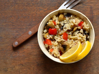 Rice with vegetable and mushroom, vegetarian nutrition, top view, copy space