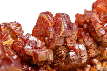 Macro mineral stone Vanadinite on a white background