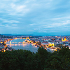 Evening panorama of Budapes from Gellert Hill with a beautiful sunset sky