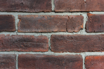 Red brick wall closeup texture