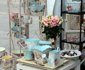 Decorative items in vintage style with a bouquet of roses