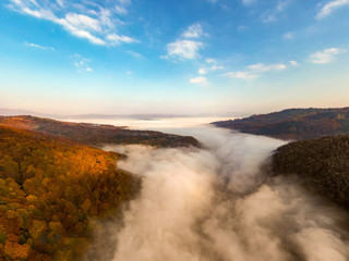 Foggy morning panorama in Jiului Canyon Transylvania Romania