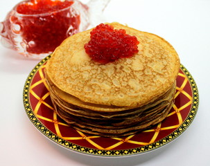 Delicious homemade pancakes with red caviar