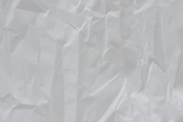 Crumpled paper texture white background.