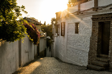 Romantic alleys of Granada, Spain at sunset