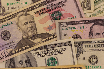 Background of different dollar banknotes