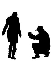 Man with camera and woman on white background