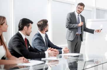 speaker makes a report for the business team.