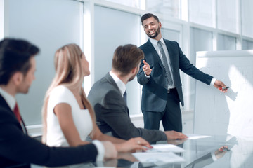 boss, explaining business to the team the company's new strategy