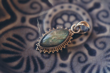 Fototapeta premium Labradorite stone sterling silver pendant