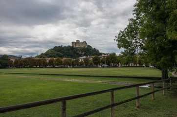 Rocca di Angera castle, view out off Angera town's embankment of lake Maggiore, Italy
