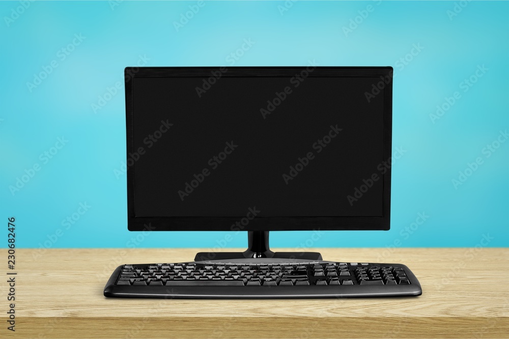 Poster desktop computer and keyboard on background
