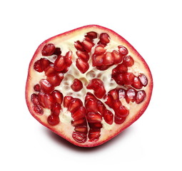 Pomegranate cut in half with seeds isolated on white background