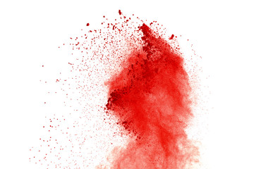 Red powder explosion on white background. Paint Holi.