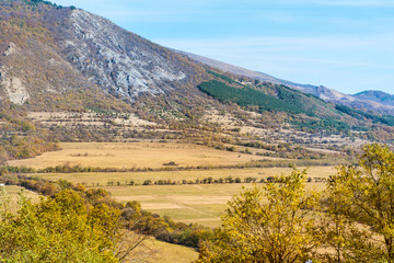 Obraz premium Beautiful Colorful Autumn Mountain with Small Village in Bulgaria