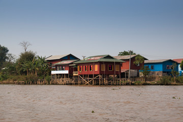 Houses at the shore of Inle Lake, one of the top tourist attractions of Myanmar
