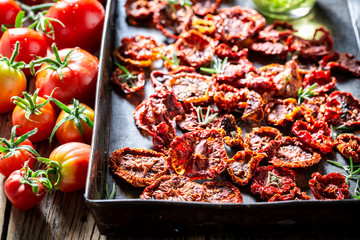 Homemade tomatoes dried in the sun as aromatic ingredients