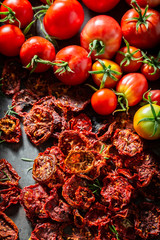 Homemade tomatoes dried in the sun on baking tray