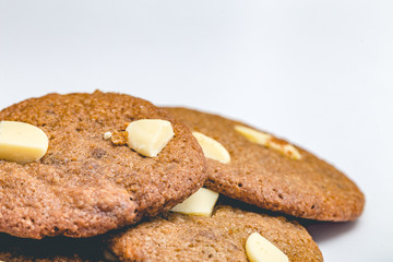 Chip cookie homemade with white chocolate isolated on white background.