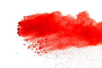 Red powder explosion on white background. Paint Holi.