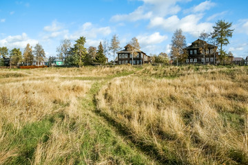 Fototapeta premium Autumn in the Northern Russian village. Arkhangelsk region. Mezen
