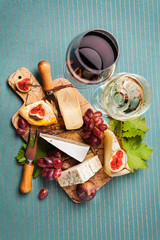 Variety of cheeses on serving board