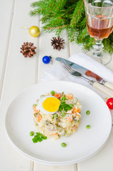 Russian traditional salad Olivier with vegetables and meat for New Year and Christmas.