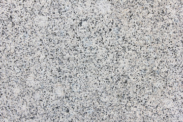 Granite Textured Background of Grey and White Color Mineral Stone. Simple Light Surface of Natural Granite Material. Top View of Abstract Seamless Stone Backdrop with Empty Copy Space 