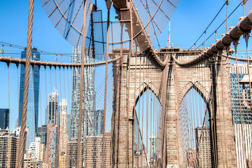 The scenic Brooklyn Bridge with the skyline of Manhattan in the background in New York City, USA

